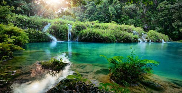 Cascades National Park in Guatemala Semuc Champey at sunset.